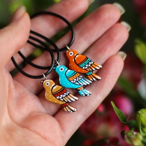 Colorful bird pendant made of wood. Tiny bright tropical bird pendants for girls. Small flying bird pendant. Long distance relationship gift
