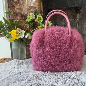 Pink sheepskin fur handbag