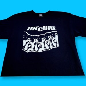 The Cure Japanese whispers goth Logo shirt available in adult men’s sizes