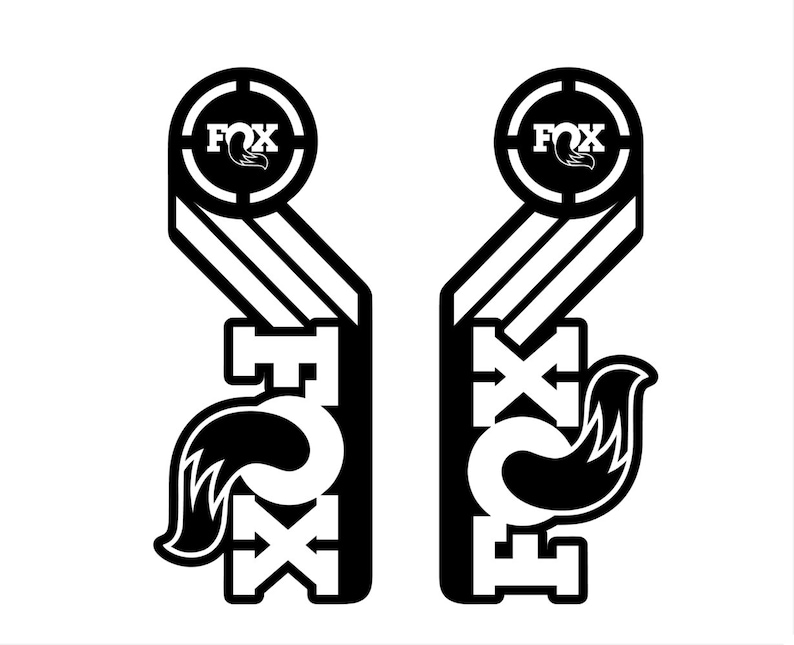 May include: Black and white graphic design featuring the word "FOX" in a circle with a target symbol. The graphic is repeated twice, with a stylized fox tail extending from the bottom of each graphic.