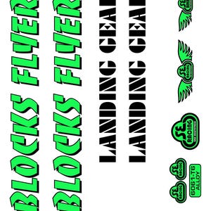 May include: A collection of bicycle decals and logos. The decals feature the text "BLOCKS FLYER" in green, and "LANDING GEAR" in black. Several logos include the text "SE RACING" and "SE BIKES" with wing designs. The text "6061-T6 ALLOY" is also present.