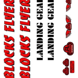 May include: White background with red and black text and logos. The text includes "BLOCKS FLYER" and "LANDING GEAR". Logos feature wings and the letters "SE". Additional text reads "6061-T6 ALLOY".