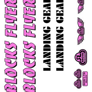 May include: A white background features various graphics and text elements. The words "BLOCKS FLYER" are in pink, outlined in black. The words "LANDING GEAR" are in black. There are also SE Racing logos with wings and the text "6061-T6 ALLOY".