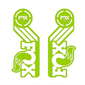 May include: Two lime green Fox Racing decals with a white fox logo and the word "FOX" in white. The decals feature a stylized fox tail and the word "FOX" repeated in a layered design.