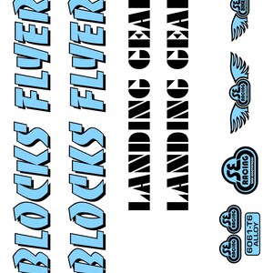 May include: White background with various black and light blue text graphics. The text includes "BLOCKS FLYER" and "LANDING GEAR". Several logos with wings and the text "SE RACING" are also present. A small rectangle reads "6061-T6 ALLOY".