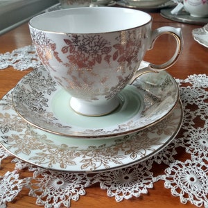 Imperial Fine Bone China Trio. Lovely White & Mint Green China with 22 carat Gold Filagree Pattern/Gilded Edges. Made in England. In VGC