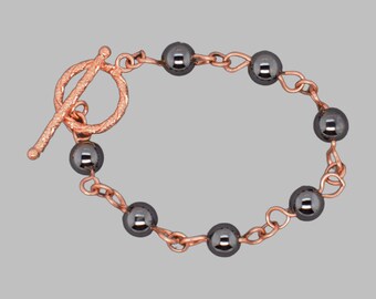 Pulseira de contas em cobre e hematita, ideal para presente de 7º ou 11º aniversário.