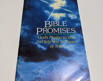 May include: A blue book with a white star and clouds on the cover. The title is "Bible Promises" and the subtitle is "God's Pledge to You to Help You in Times of Trial".