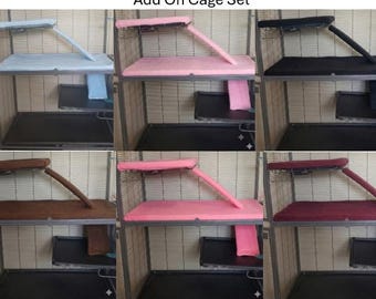 May include: A Ferret Nation/Critter Nation Add On Cage Set featuring six color variations of fabric cage liners, including light blue, light pink, black, brown, bright pink, and maroon, each with a matching ramp cover and platform cover.