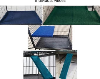 May include: Ferret Nation/Critter Nation Individual Pieces. A collection of fabric cage liners, shelf covers, and ramp covers in navy blue, forest green, royal blue, and teal. These textile accessories are designed to fit wire pet cages.