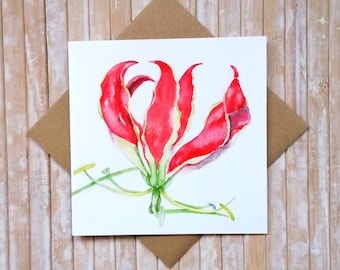 Red Flame Lily Flower Greeting Card FSC certified -of FLAME LILY - Glorious Superba, by Geetapatelfineart. Floral Card. Eco Friendly Product