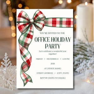 May include: A white rectangular invitation card featuring a large red, green, and white plaid ribbon bow in the top left corner. The text reads: YOU'RE INVITED TO THE OFFICE HOLIDAY PARTY, Let's celebrate a wonderful year together!, FRIDAY, DECEMBER 11, 6:00 PM, 2026, AT [VENUE NAME], [STREET ADDRESS], [CITY, STATE], RSVP BY [DATE] TO [EMAIL].