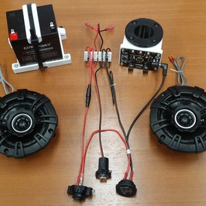 Battery Powered BlueTooth Speaker Kit with Voltmeter & plug in Charger. Detailed instructions with templates. You supply the 50 cal Can.