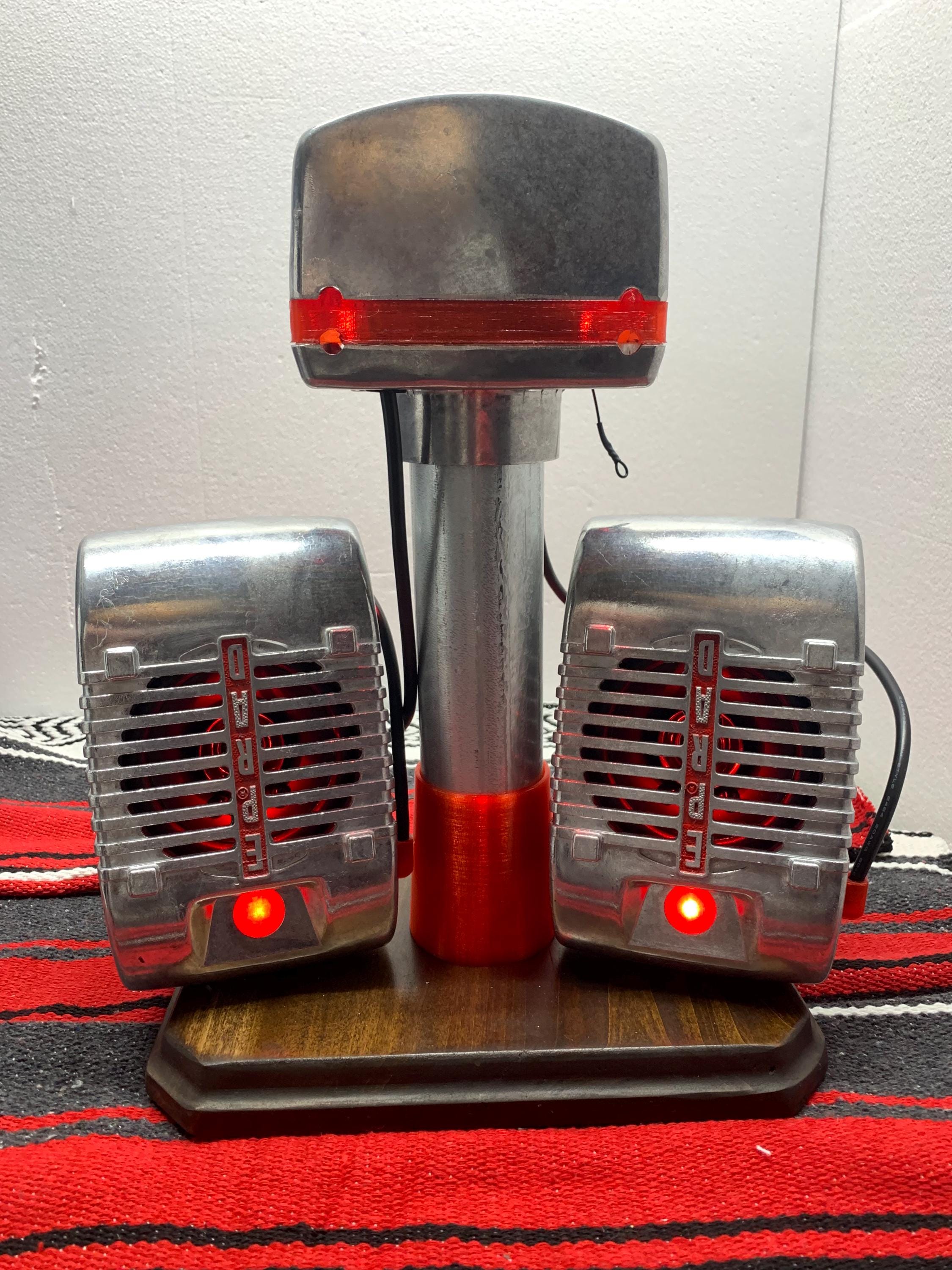 Dual EPRAD Drive In style speaker system wired to illuminated speakers and junction box with red LED's.  Battery powered.