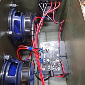 Battery Powered BlueTooth Speaker Kit with Voltmeter & plug in Charger. Detailed instructions with templates. You supply the 50 cal Can.