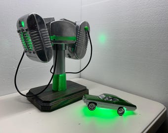 Dual EPRAD Drive In style speaker system wired to illuminated speakers and junction box with green LED's.  Battery powered.