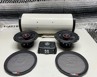 Compact Bedroll Speaker System from 6" sch 40 PVC tube. Includes two 6.5" Cerwin-Vega coax  speakers. Bluetooth 200W AMP and blk/wht Serape.