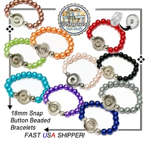 May include: A collection of beaded bracelets in various colors, each featuring an 18mm snap button. The bracelets are in shades of red, black, blue, green, purple, and more. The text "18mm Snap Button Beaded Bracelets" is visible.