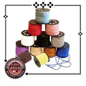 May include: A collection of eleven spools of cord in various colors including light blue, red, pink, white, black, gray, purple, tan, brown, yellow, and blue. A circular logo in the corner features the text Faux Fancies We Stand Together.