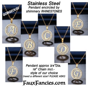 May include: A gold-toned stainless steel circular pendant necklace featuring a central cutout letter encircled by shimmery rhinestones. The pendant is approximately 0.75 inches in diameter and includes an 18-inch chain. Text includes Stainless Steel, Pendant encircled by shimmery RHINESTONES, Pendant approx 3/4"Dia. 18" Chain incl.-style of our choice (need a different size? PLEASE ASK!) and FauxFancies.com.