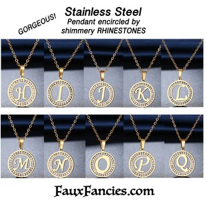 May include: Ten gold-toned stainless steel circular pendants on matching chains, each featuring a central letter from H to Q. The circular frame of every pendant is encrusted with clear, shimmery rhinestones. Text reads: Stainless Steel Pendant encircled by shimmery RHINESTONES, GORGEOUS!, and FauxFancies.com.