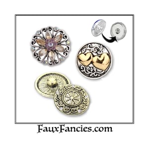 May include: An assortment of decorative snap buttons in various designs. One button features a flower design with crystals, another has two gold hearts, and a third has an ornate pattern with crystals. The website FauxFancies.com is displayed.