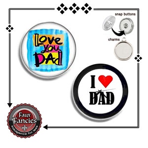 May include: Two round buttons with a white background and black borders. The first button has a blue, yellow, pink, and orange design with the text "Love you Dad". The second button has a red heart with a needle through it and the text "I love Dad".