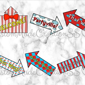 May include: Five colorful arrow signs with red and blue stripes and polka dots. The signs say "Welcome!" "Partyville!" "That Way!" "This Way!" and "Party Here!"