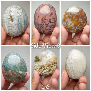 Puede incluir: Seis piedras pulidas, lisas y ovaladas con varios patrones de marr&oacute;n, blanco, verde y rosa. Las piedras est&aacute;n dispuestas en una cuadr&iacute;cula con el texto "Side View 3" y "1-6" debajo.