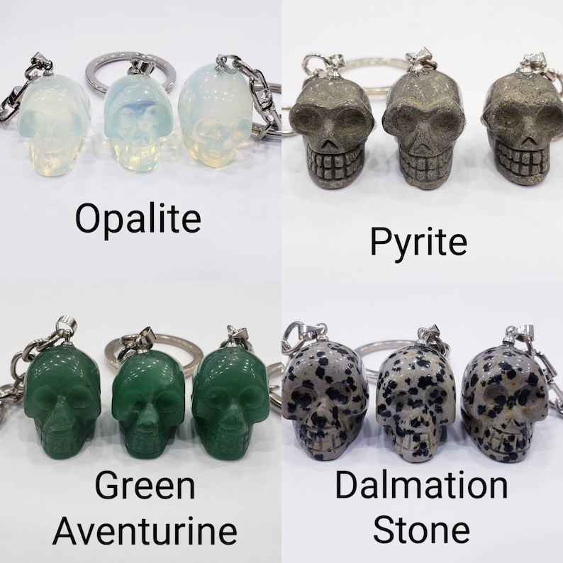 May include: Three sets of three crystal skull keychains. The first set is opalite, the second is pyrite, the third is green aventurine, and the fourth is dalmatian stone.