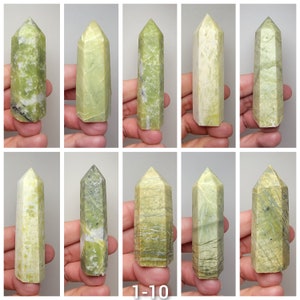 May include: Ten green serpentine crystal points, each with a unique pattern of veining. The points are arranged in two rows of five, with the text "1-10" below the bottom row.