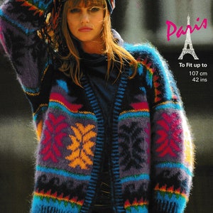 May include: A colourful knitted cardigan with a geometric pattern in shades of blue, purple, red, yellow, and orange. The cardigan has a long, loose fit and is designed to fit up to 107 cm.