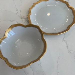 Gold- rimmed bowl/cup and saucer