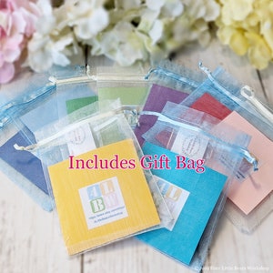 May include: Assortment of colorful organza gift bags with a small card that reads "Includes Gift Bag" and a website address for 4LittleBeans Workshop.