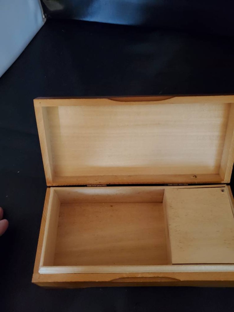 Stunning carved flowers with carved trim Original tag Vintage wooden handcarved made in Switzerland jewelry musical box Rectangular shape
