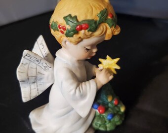Vintage blonde angel putting star on Christmas tree figurine! Handpainted bisque figurine! Stunning adorable angel!