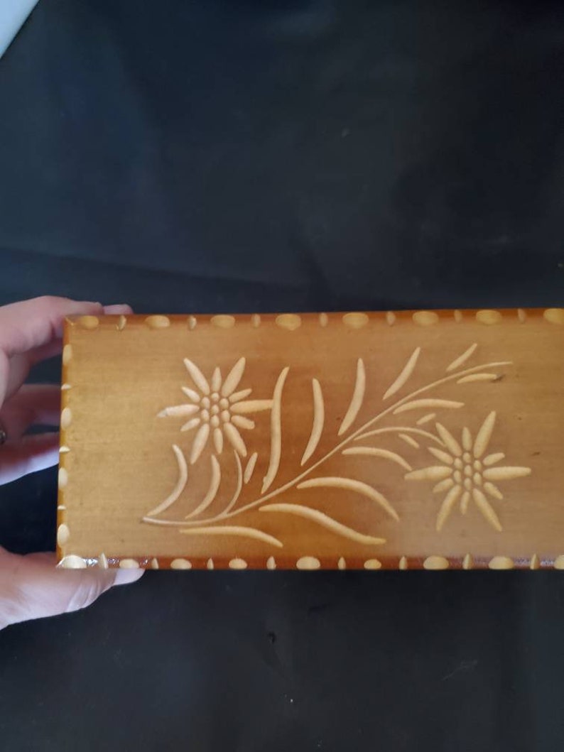 Stunning carved flowers with carved trim Original tag Vintage wooden handcarved made in Switzerland jewelry musical box Rectangular shape