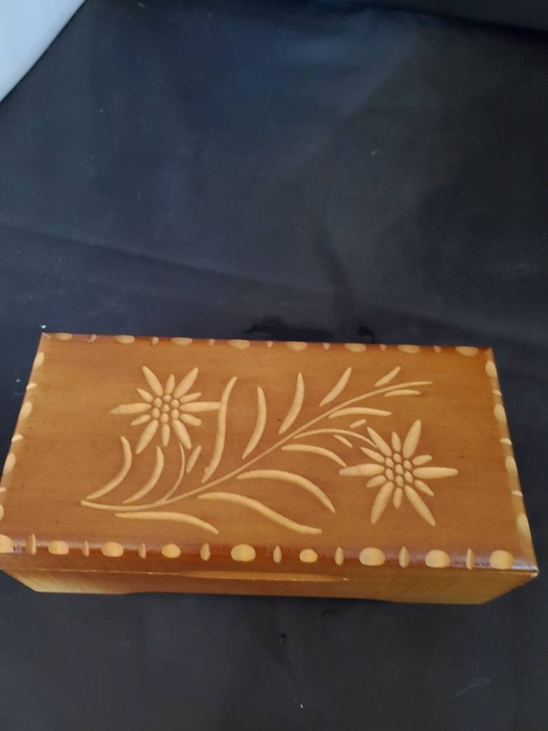 Stunning carved flowers with carved trim Original tag Vintage wooden handcarved made in Switzerland jewelry musical box Rectangular shape