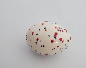 Vintage Easter egg ceramic speckled color with red and blue!