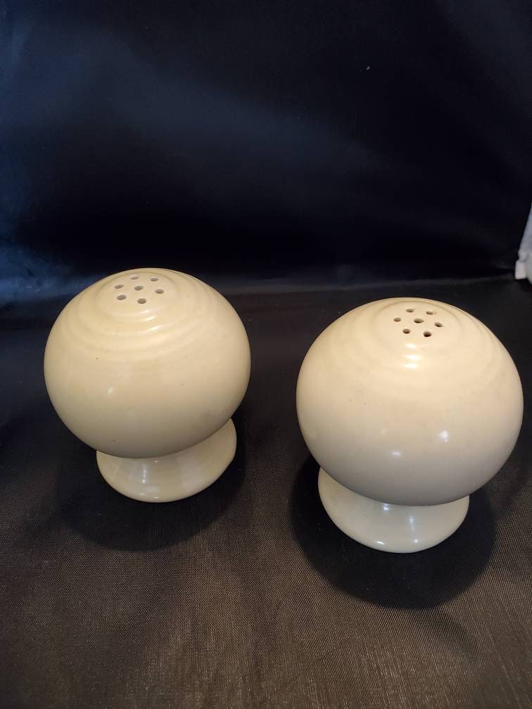 Vintage Fiestaware salt and pepper shakers round Pale Yellow. Etsy
