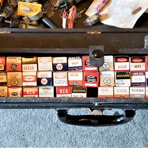 Rare 1940s to 1950s Vintage Westinghouse Tube TV Repairman Toolbox with assortment of old tubes and tools.
