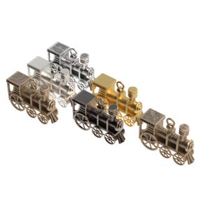 May include: A collection of miniature train models in various metallic finishes, including gold, silver, bronze, and black. Each train features detailed wheels, a smokestack, and a cab, showcasing a classic locomotive design.