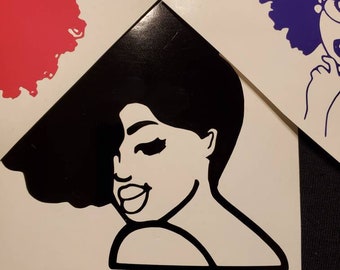 May include: Black and white silhouette of a woman with an afro hairstyle. The woman is smiling and looking to the side. The image is a digital illustration.