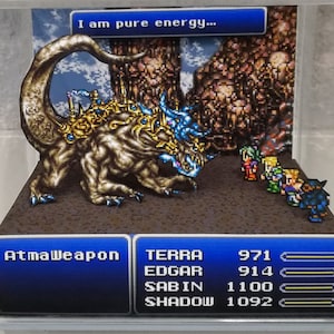 May include: A diorama depicting a pixelated monster labelled "AtmaWeapon" facing a group of pixelated characters. The diorama includes text that reads "I am pure energy..." and character stats. The monster is brown, blue, and gold.