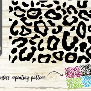 May include: A seamless repeating pattern of black leopard spots on a white background. The pattern is shown in four different colour variations: pink, purple, green, and blue.