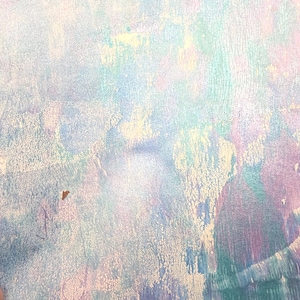 May include: Abstract artwork with a textured surface. The color palette includes shades of blue, purple, green, and white, creating a soft, ethereal effect. The piece has a layered appearance, with visible brushstrokes and a subtle, iridescent sheen.