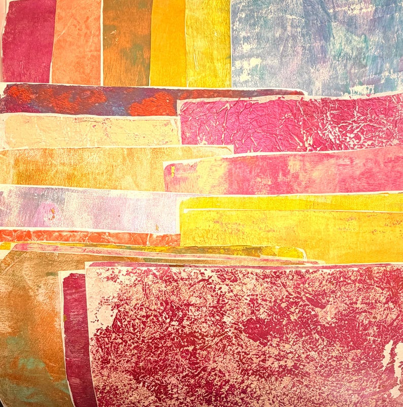 May include: Abstract artwork featuring layered rectangular shapes in various colors. The color palette includes shades of red, pink, yellow, orange, and blue. The textures vary, with some areas appearing smooth and others textured.