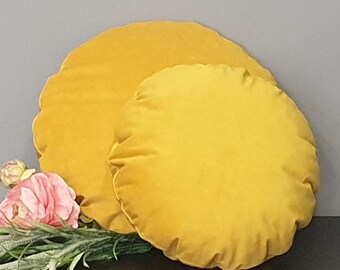 round mustard pillow