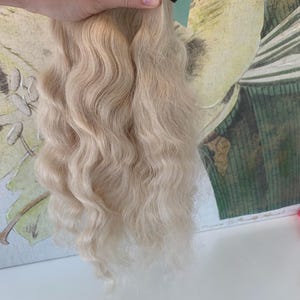 Remy Indian Human Hair, Blonde colour, professional saloon-grade premium quality, wavy bulk, single donor hair, cuticles aligned.
