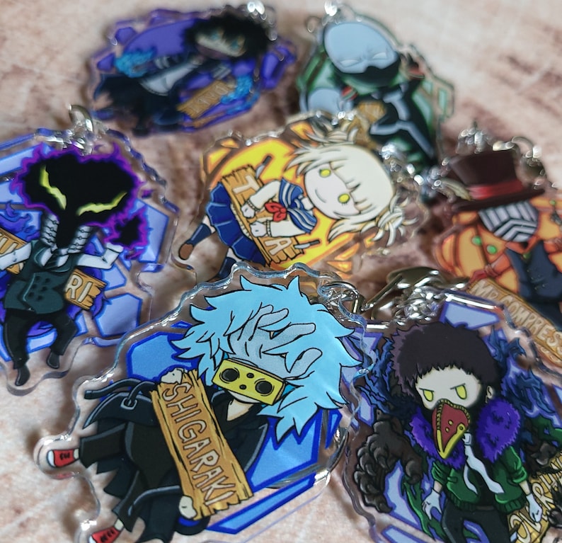 May include: A set of 10 colorful anime character keychains. The keychains feature characters from the popular anime series My Hero Academia. Each keychain is made of clear acrylic and features a different character with their signature quirk. The keychains are perfect for fans of the show and make a great gift.
